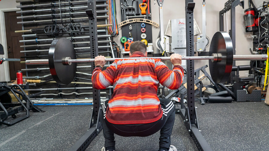 coop performing a squat on the REP SR-4000 Squat Rack