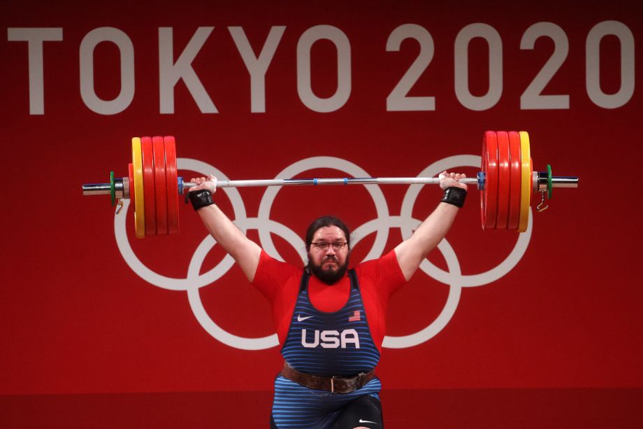 Man lifting at the 2020 Tokyo Olympics