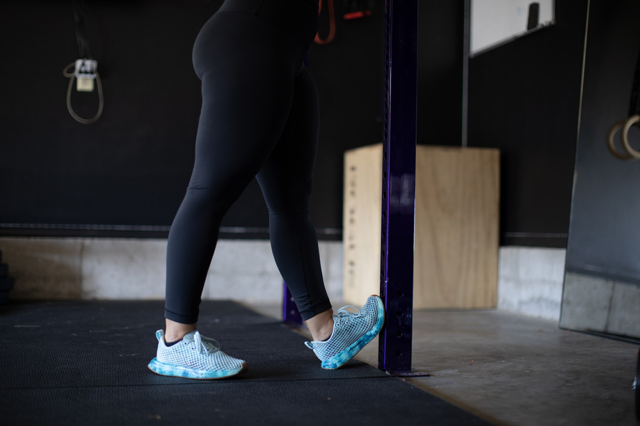 woman doing calf stretch