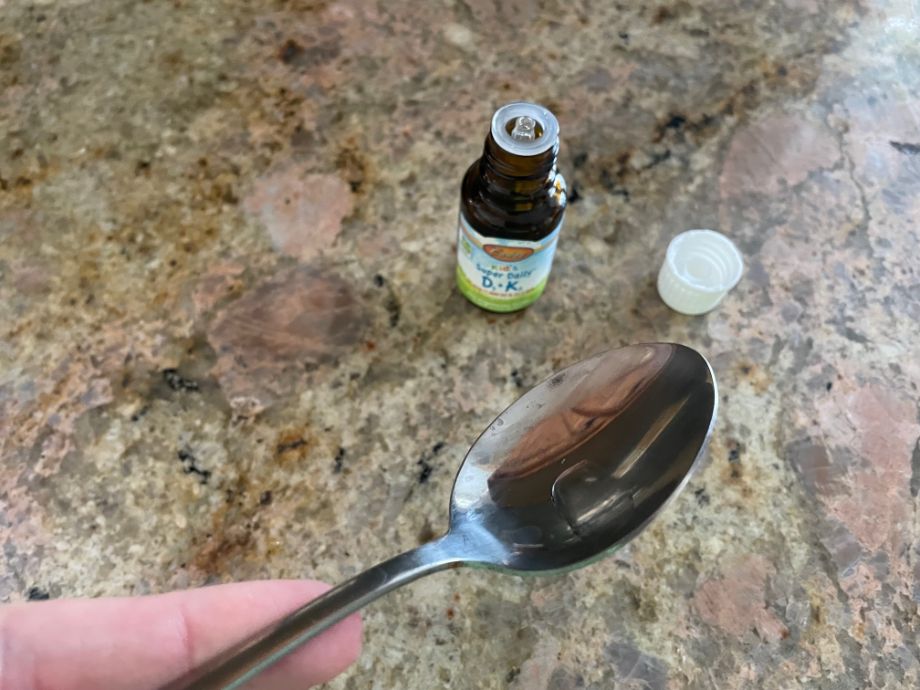 An image of Carlson Kid's Super Daily Vitamin D3 K2 in a spoon