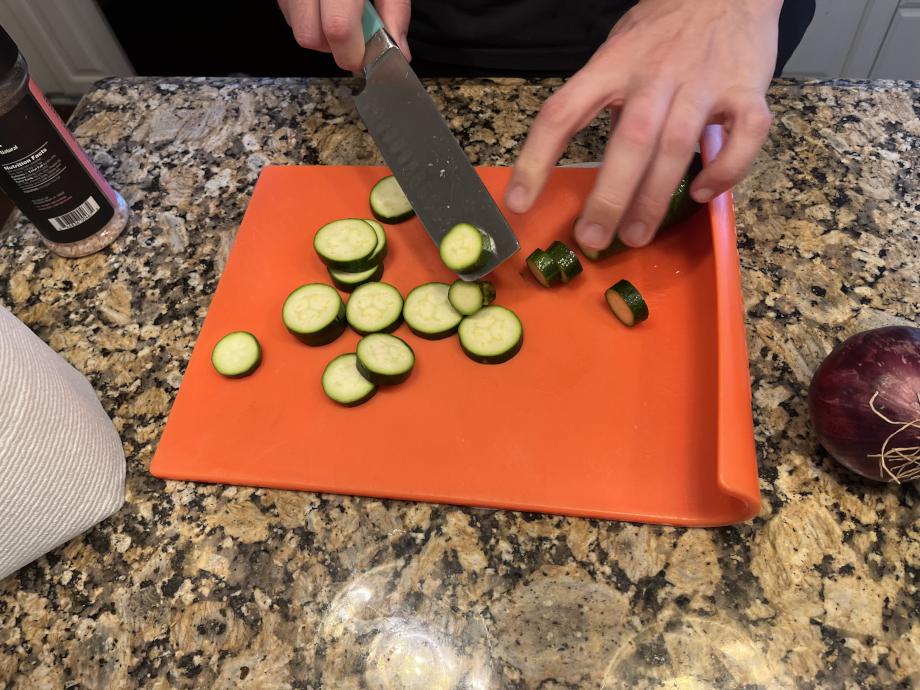 Our tester chops zucchini from Martha and Marley Spoon