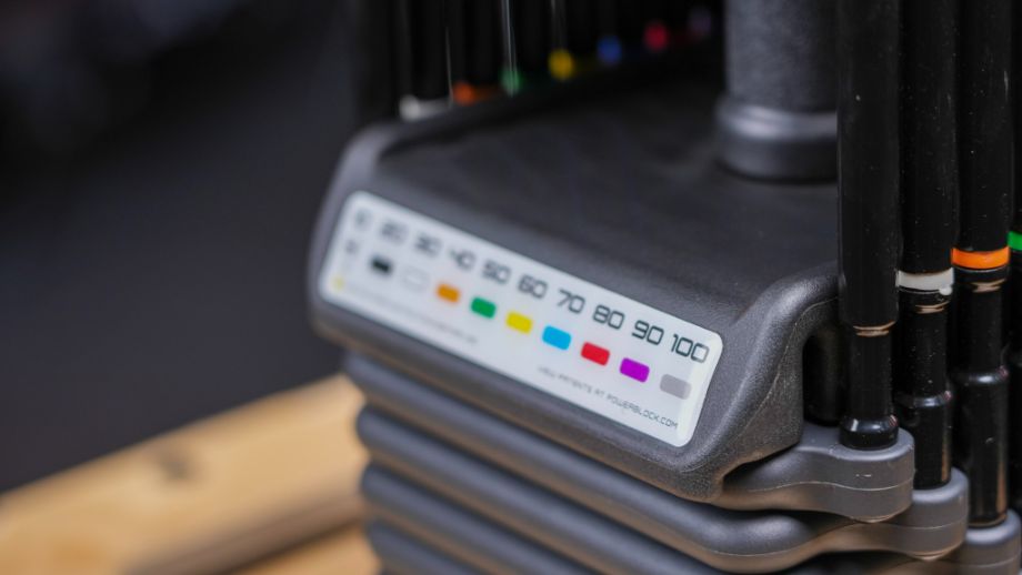 Label explaining the color-coding system of the PowerBlock Pro 100 EXP Dumbbells
