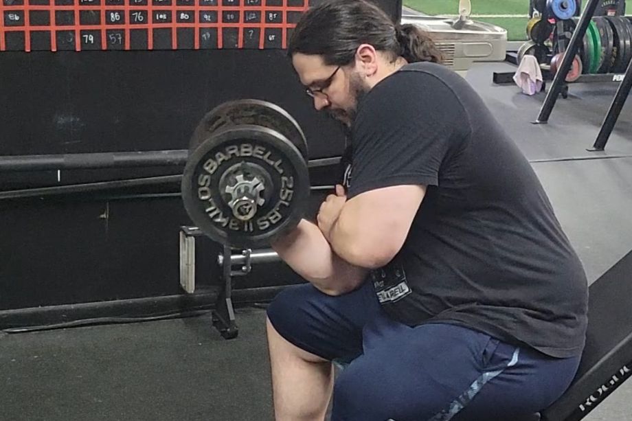 Concentration curl using the Titan Loadable Olympic Dumbbell Handles