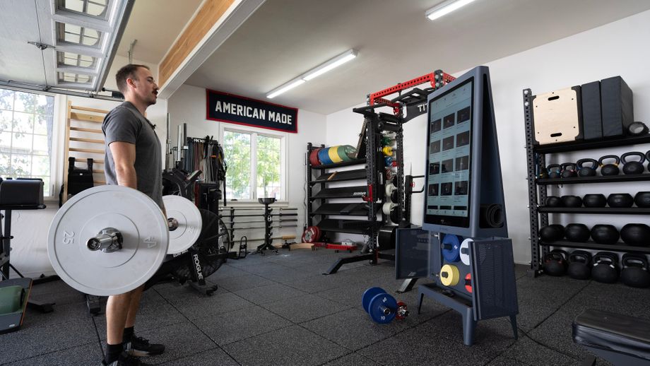 Coop doing deadlifts during a workout with Tempo Studio