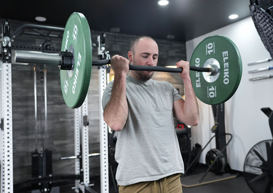 coop-doing-a-barbell-curl