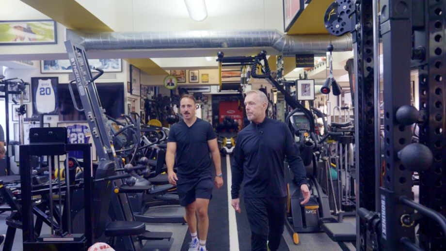 Coop walking through Gunnar Peterson's gym.