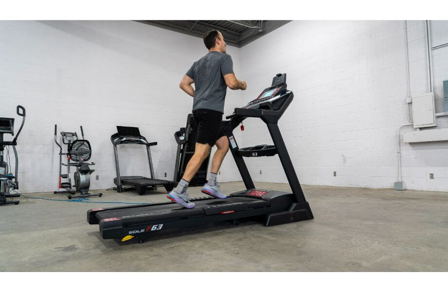 coop jogging on sole treadmill