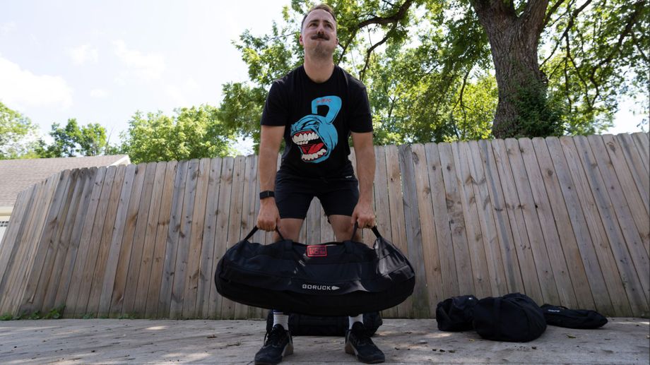 Coop using the GORUCK Sandbag