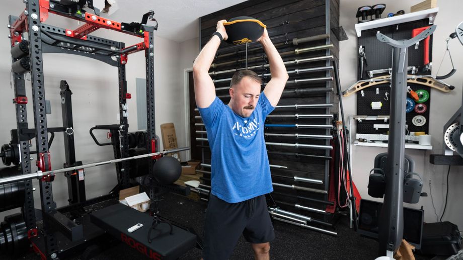 Coop using the Hyperwear SandBell PRO during a workout