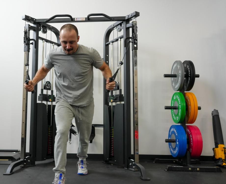 Coop using the Titan Fitness FUnctional Trainer