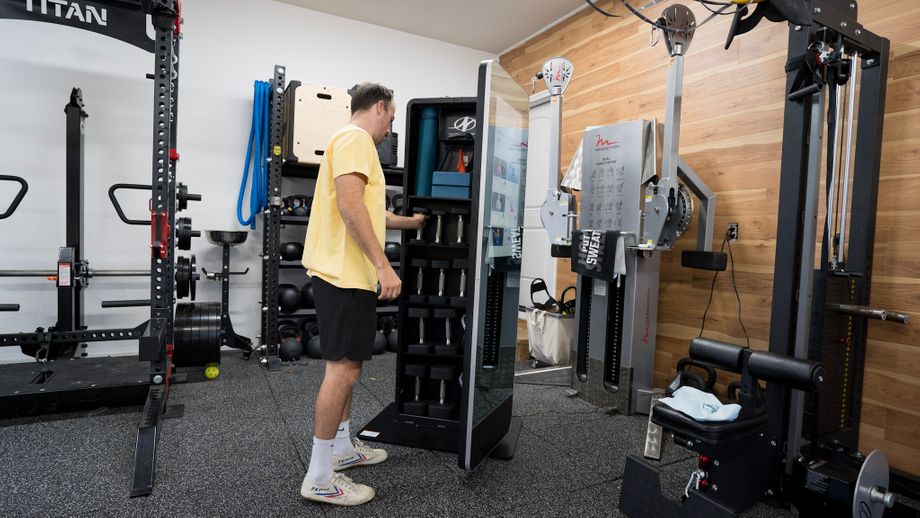 Coop working out with the NordicTrack Vault