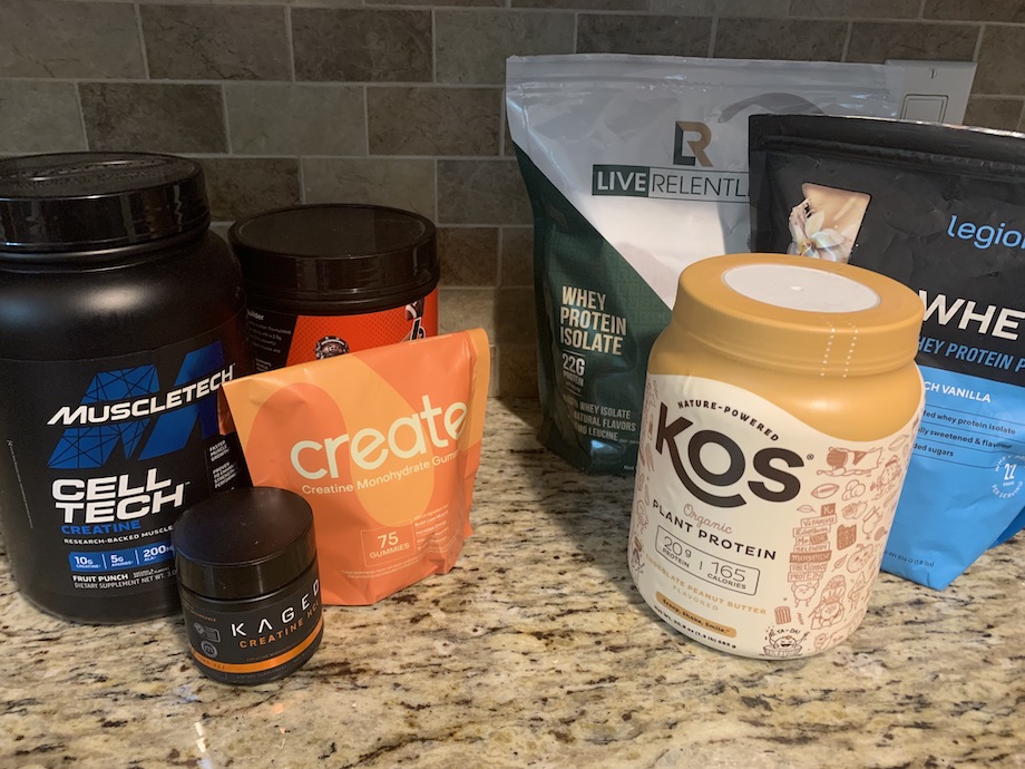 An image of creatine vs protein supplements on a counter