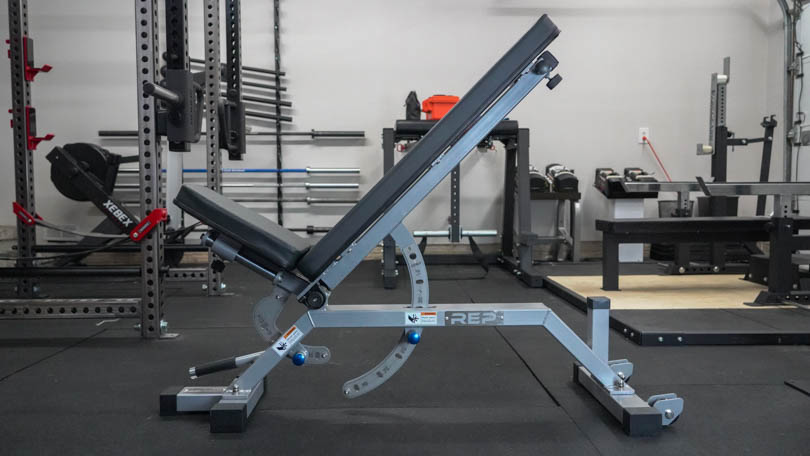 The REP Fitness AB-5000 Zero Gap in a home gym