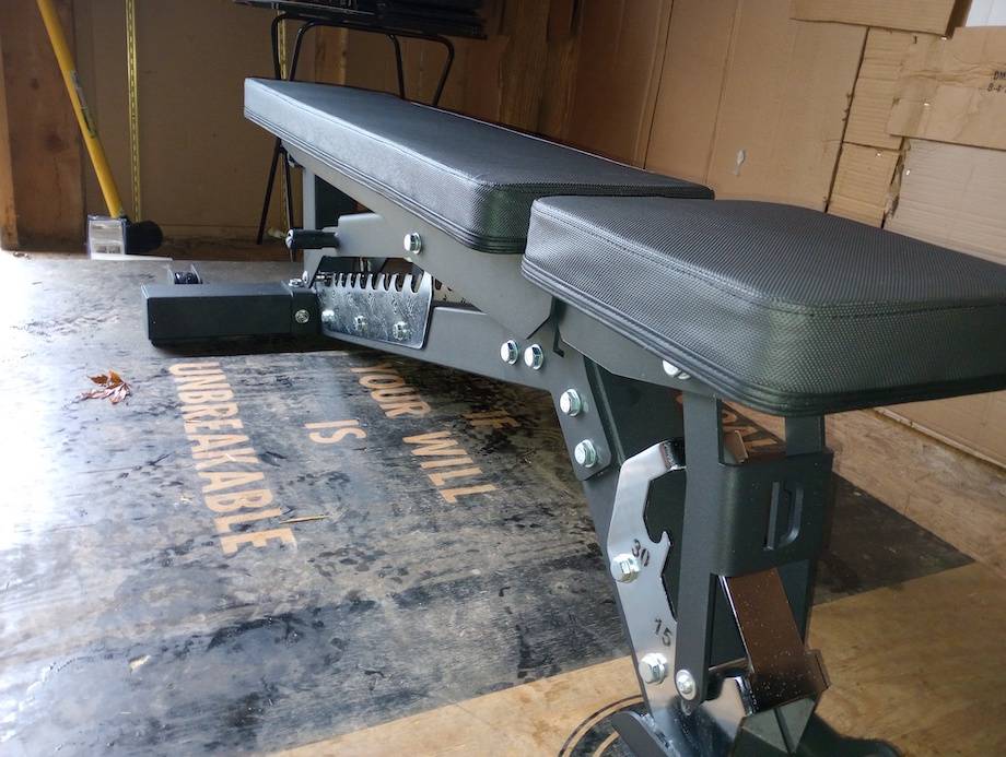 DMoose Adjustable Bench is shown in a garage gym