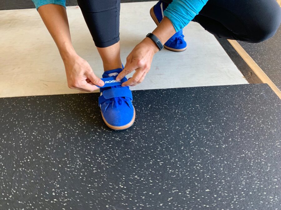 Woman lacing up the Do-Win Classic Lifter