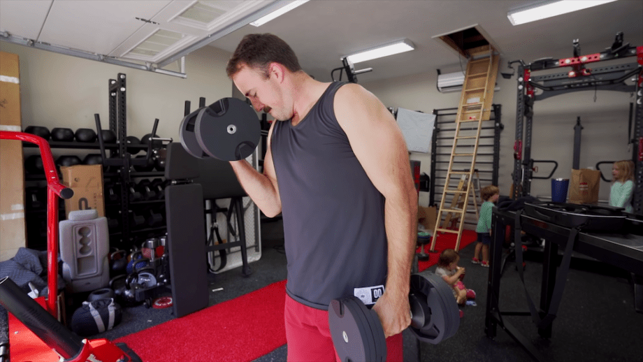 coop using dumbbells for biceps