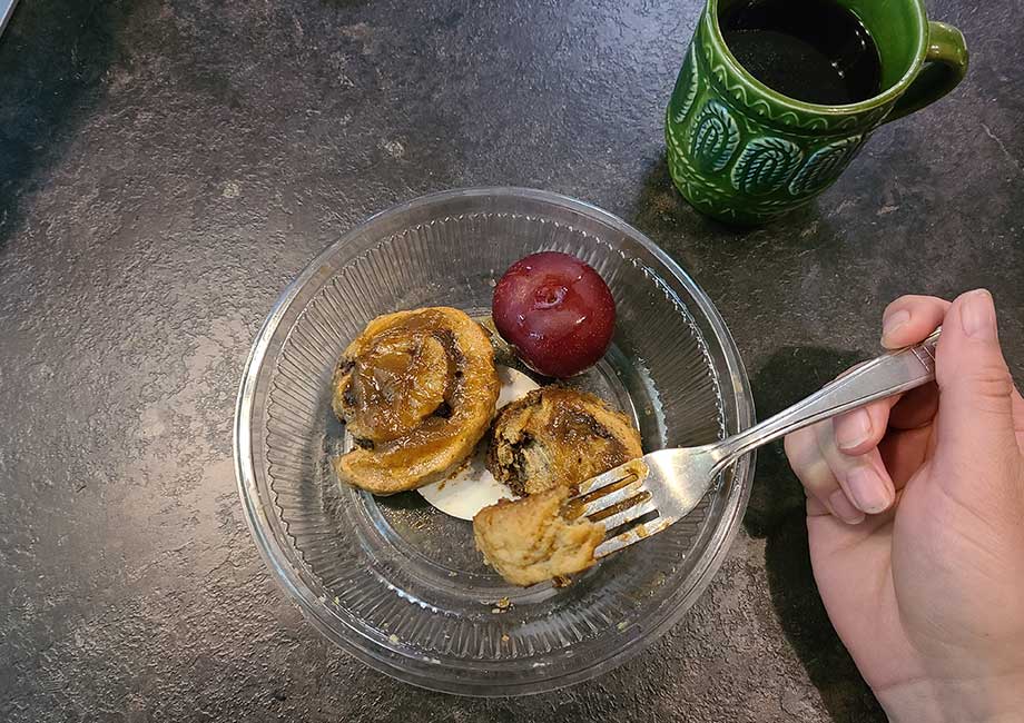 Woman eating a Sakara Life breakfast meal