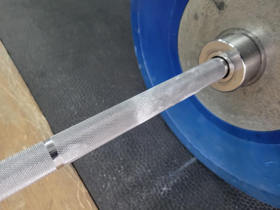 Close look at the sleave on an Eleiko IWF Weightlifting Training Bar.