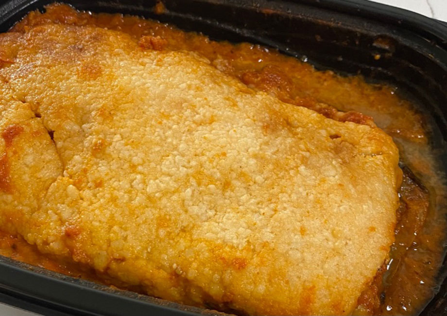 Lasagna in the baking container from the Epicured Meal Delivery Service.