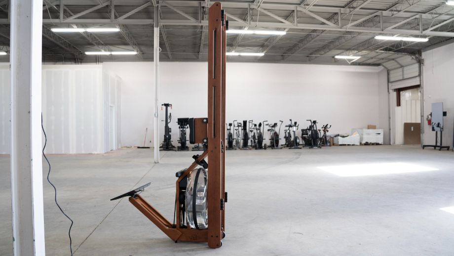 Ergatta rowing machine stored upright.