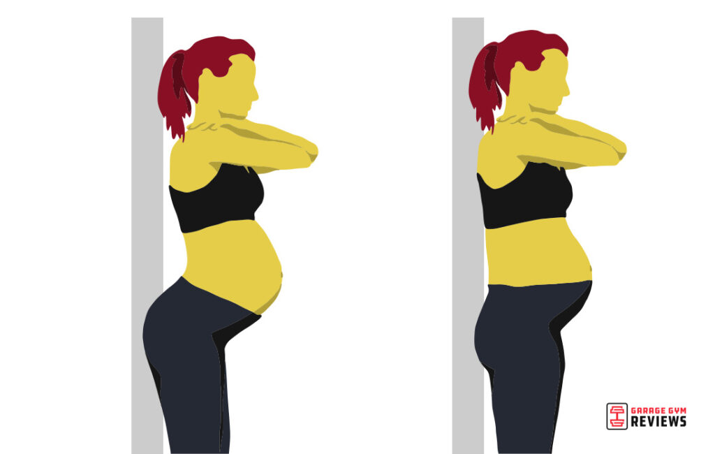 Pregnant person doing standing pelvic tilt
