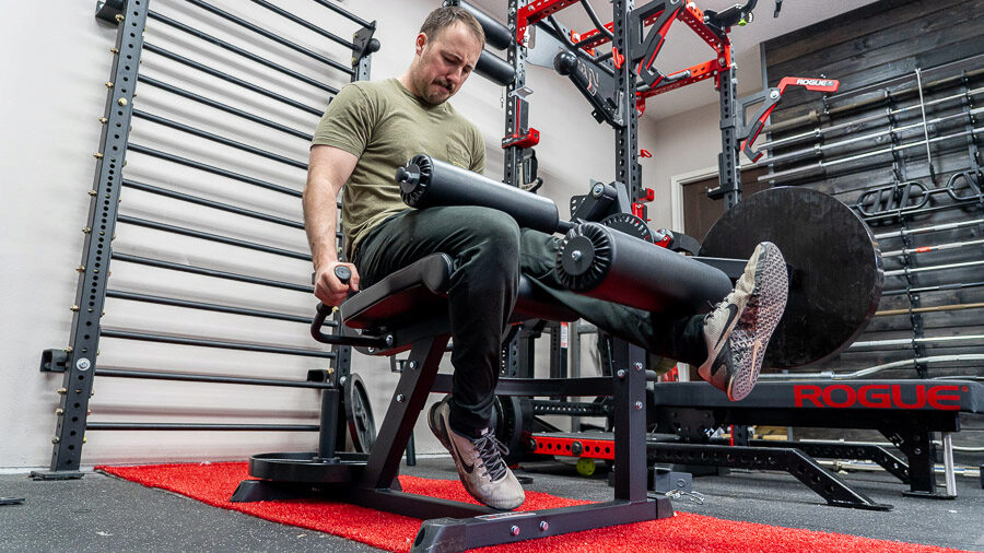 Coop doing Single-leg extension on Titan Seated Leg Curl/Extension 