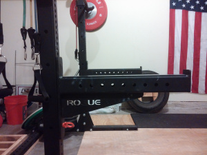 Rogue SML-2 Squat Stand in a garage gym