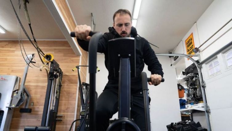 The 6 Best Air Bike Workouts to Target Your Entire Body Cover Image