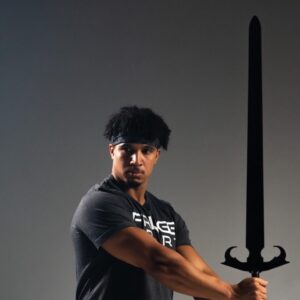 Main image of a man using the fringe sport fitness sword mace.