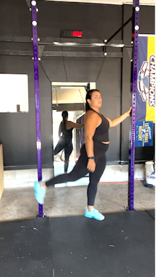 person doing front leg swings