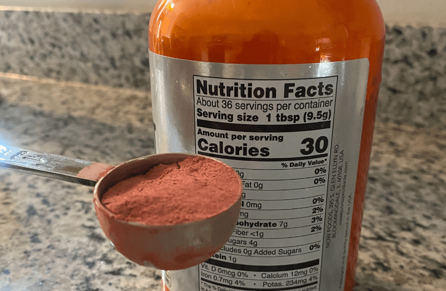 A single-scoop serving of NOW Foods Beet Root Powder