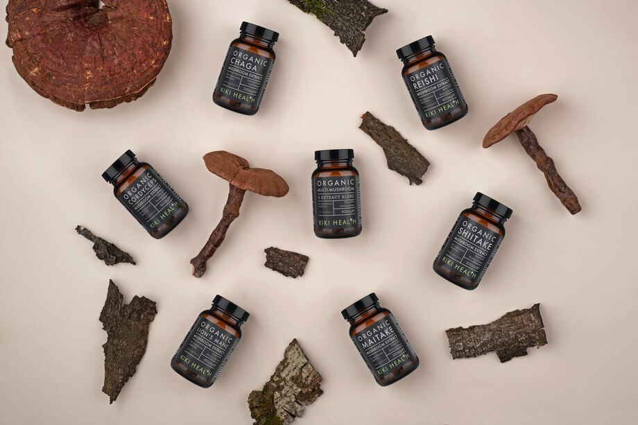 overlay pfoto of muschrooms and bottles of supplement