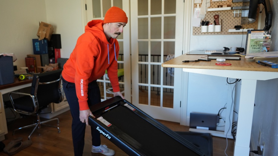 Coop moving the Goplus treadmill.