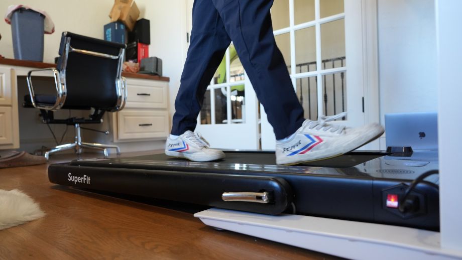 Coop walking on the Goplus treadmill.