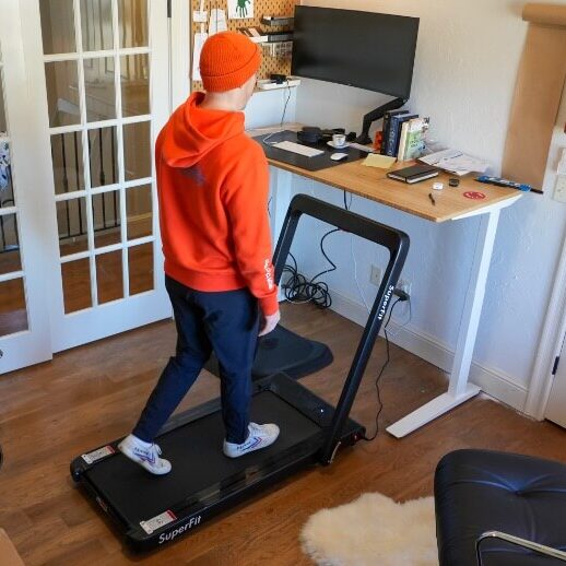 Coop walking on the Goplus treadmill.