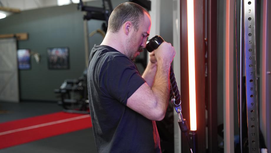 Coop doing curls with the Gronk Fitness Functional Trainer.