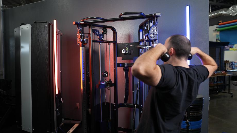 Coop works out with the Gronk Fitness Functional Trainer.