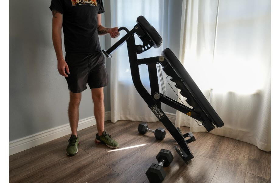 hammer strength adjustable bench being moved