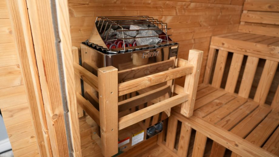 A Harvia heater in a Redwood Outdoors sauna