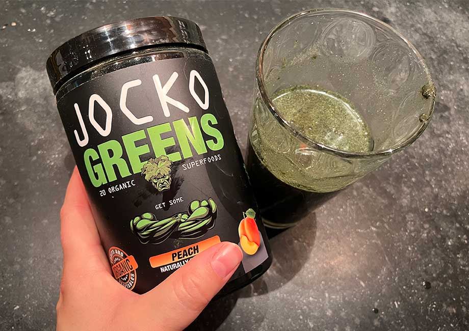 Holding Jocko Greens Container