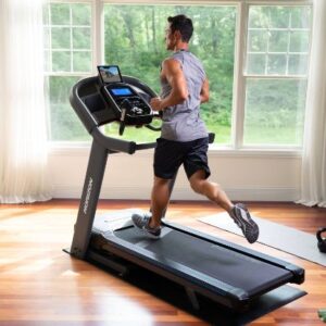 Horizon 7.4 treadmill being used by a person