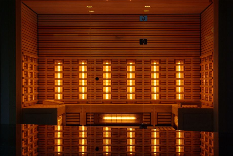 Photo featuring the inside of a large infrared sauna