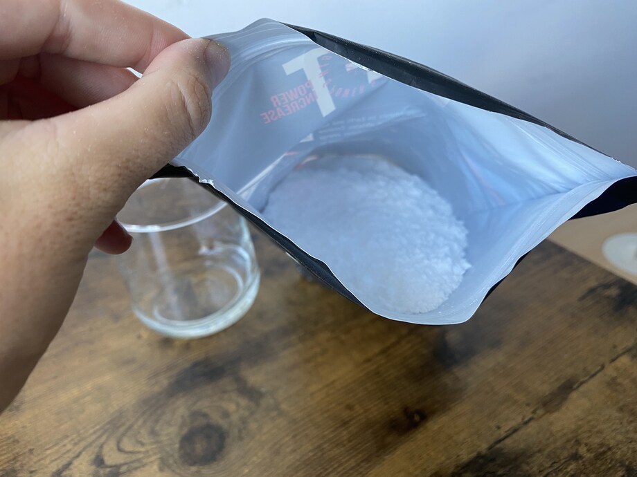 Looking down into a bag of  XWERKS Lift Creatine powder