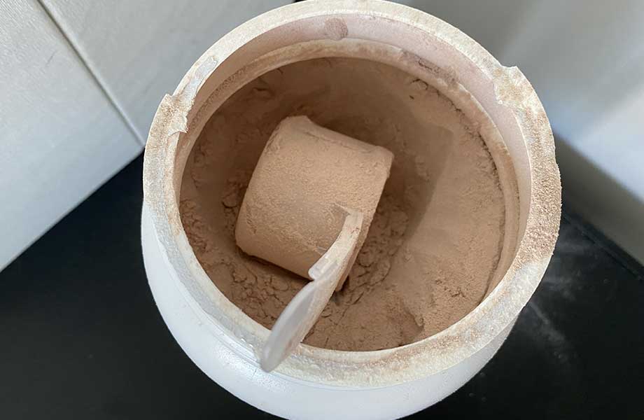 Looking down into a container of Transparent Labs Casein Protein powder.