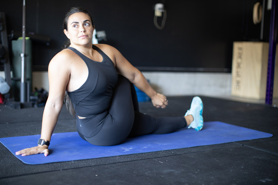 woman doing hip stretch