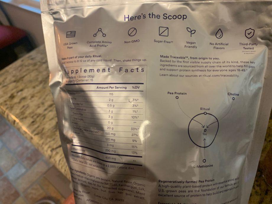 The Supplement Facts label is shown up close on a bag of Ritual Protein Powder