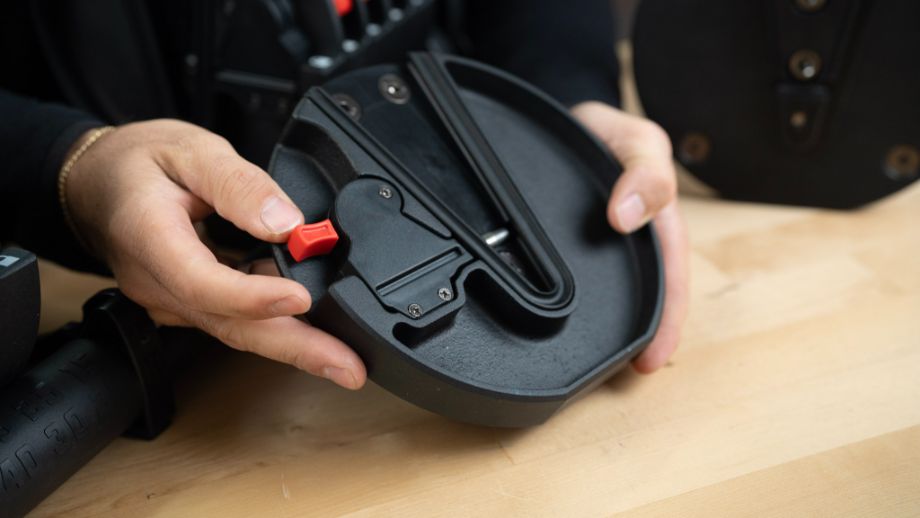 Image of the Lock-N-Load switch on a weight plate of the REP QuickDraw Dumbbell