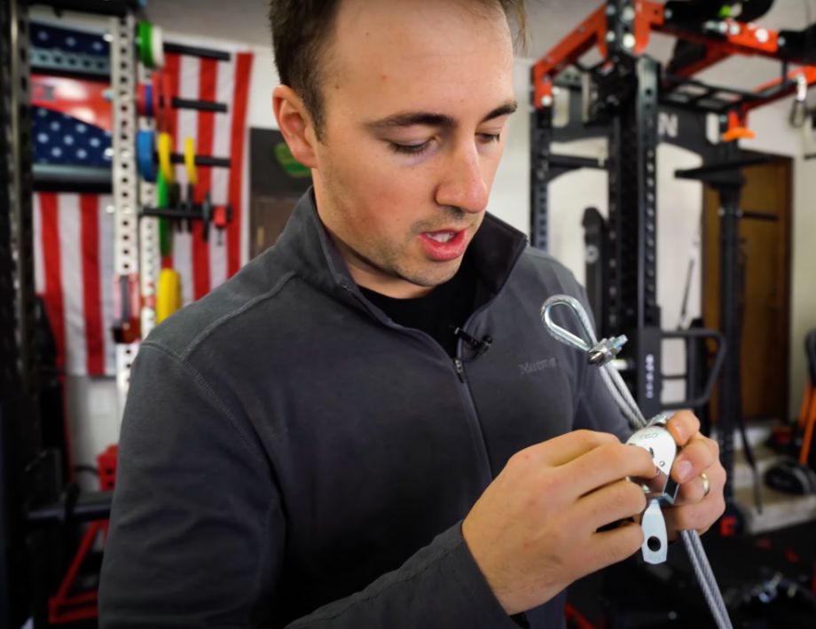 man working on a diy pulley system