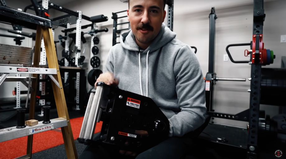 Man holding trolley for a diy lat pulldown