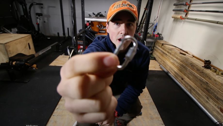 Man showing carabiner for diy monkii bars